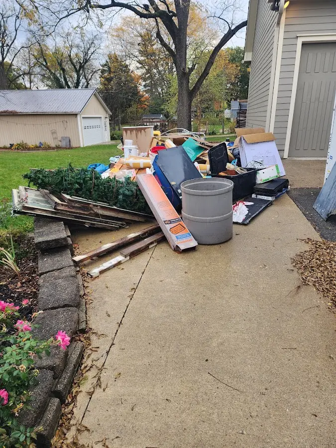 Dumpster being loaded with debris for 3 Yard Dumpster Rental in Walterboro